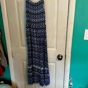 This blue black and white dress is a girls size medium